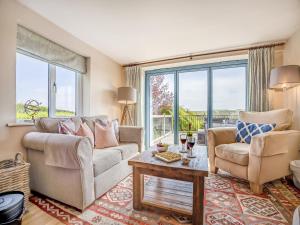 Posezení v ubytování The Cottage