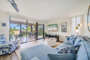 a living room with a couch and a table at Wailea Ekahi 21A · WEK 21A Remodeled Wailea Condo Pool AC Near B in Wailea