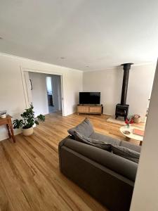 Μια τηλεόραση ή/και κέντρο ψυχαγωγίας στο Beach Escape Torquay