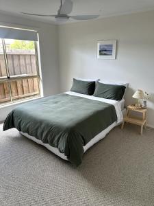 Ένα ή περισσότερα κρεβάτια σε δωμάτιο στο Beach Escape Torquay