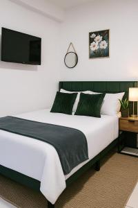 Postel nebo postele na pokoji v ubytování Sky lounge Loft vista al mar, bar en piscina