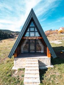 a tiny house on top of a hill at Čarobna jutra Zlatara 2 in Radijevići