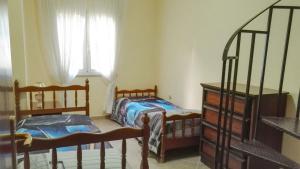 Postel nebo postele na pokoji v ubytování Villa Giovanna + 15 fotografií