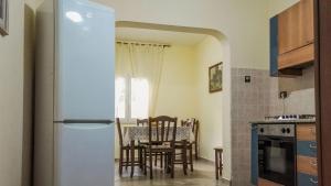 Kuchyň nebo kuchyňský kout v ubytování Villa Giovanna