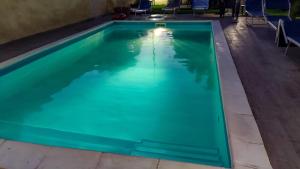 Bazén v ubytování Villa Giovanna nebo v jeho okolí