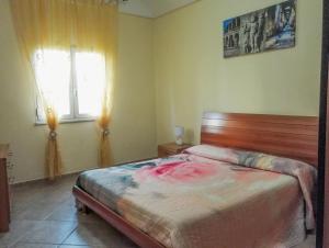 Postel nebo postele na pokoji v ubytování Villa Giovanna