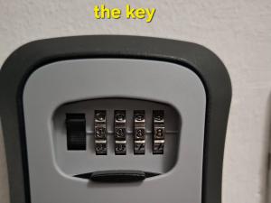 a close up of the key of a microwave at Apartment 88 SELF check-in, FREE parking in Skopje
