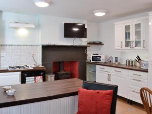 Köök või kööginurk majutusasutuses Smithy House