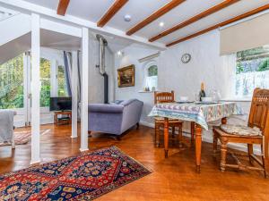 Posezení v ubytování Wisteria Lodge - Cottage