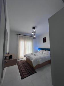 Ένα ή περισσότερα κρεβάτια σε δωμάτιο στο Apartment in Sunny Village Nabq-sharm