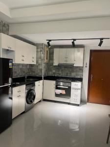 Η κουζίνα ή μικρή κουζίνα στο Apartment in Sunny Village Nabq-sharm