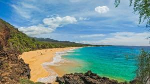 a beach in the philippines on a sunny day at Wailea Luxury Retreat Walk to Beach & Shops in Wailea +56 photos