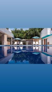 Bazén v ubytování Hotel deluxe oasis de la colina boutique nebo v jeho okolí