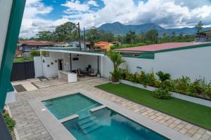 an aerial view of a house with a swimming pool at Gival Paradise in Fortuna