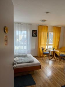 Postel nebo postele na pokoji v ubytování City Pension