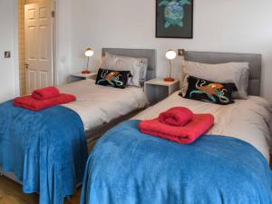 En eller flere senge i et værelse på South Terrace