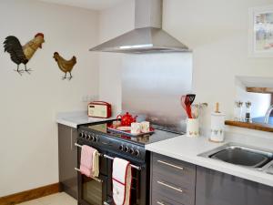 Kuchyň nebo kuchyňský kout v ubytování Tamarisk