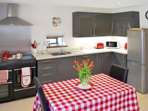 Kuchyň nebo kuchyňský kout v ubytování Tamarisk