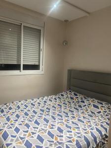 Ένα ή περισσότερα κρεβάτια σε δωμάτιο στο Appartement luxueux