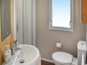 Ένα μπάνιο στο Kee Holiday Home