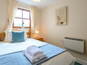 Ένα ή περισσότερα κρεβάτια σε δωμάτιο στο Limetrees +2 φωτογραφίες