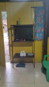 TV/trung tâm giải trí tại Chalé de Trindade