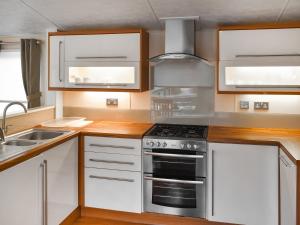 Η κουζίνα ή μικρή κουζίνα στο Inglenook Lodge