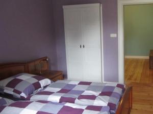 Postel nebo postele na pokoji v ubytování Villa Vogelweide