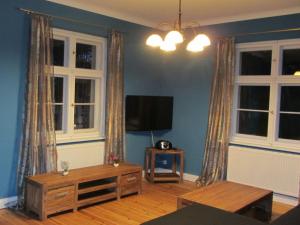 TV a/nebo společenská místnost v ubytování Villa Vogelweide