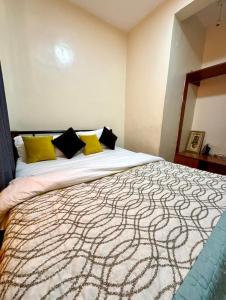 Postel nebo postele na pokoji v ubytování Hawls Apartment