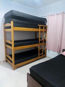 Ένα ή περισσότερα κρεβάτια σε δωμάτιο στο Damasceno Beach