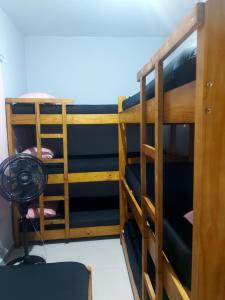 Μία ή περισσότερες κουκέτες σε δωμάτιο στο Damasceno Beach