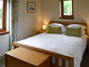 Postel nebo postele na pokoji v ubytování Allt Beag Little Streams