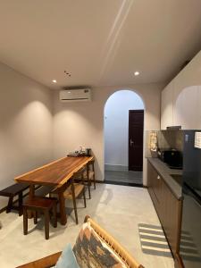 Kuchyň nebo kuchyňský kout v ubytování Pillow Homestay - Góc Mộc Mạc