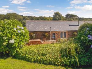 Mount HawkeにあるThe Old Dairyのレンガ造りの家