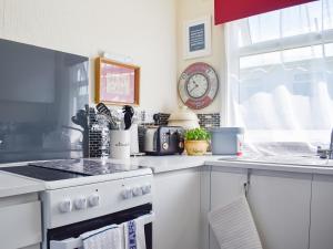 Η κουζίνα ή μικρή κουζίνα στο Escape To The Chalet