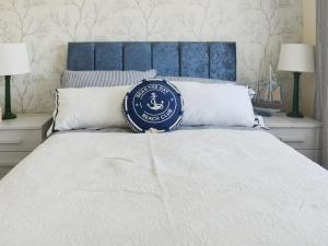 Ένα ή περισσότερα κρεβάτια σε δωμάτιο στο Escape To The Chalet +8 φωτογραφίες