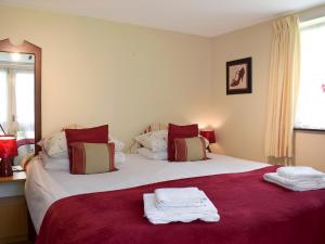 Postel nebo postele na pokoji v ubytování The Dairy