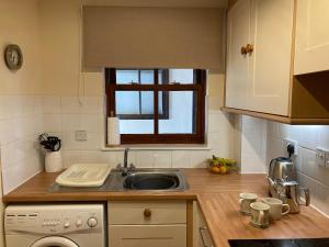 Kuchyň nebo kuchyňský kout v ubytování Ashbrooke- Hewetson Court