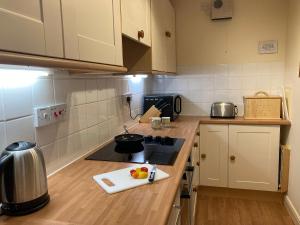 Kuchyň nebo kuchyňský kout v ubytování Ashbrooke- Hewetson Court