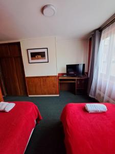 Postel nebo postele na pokoji v ubytování Hotel Condor de Plata