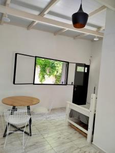 TV a/nebo společenská místnost v ubytování Casa Palihue por día