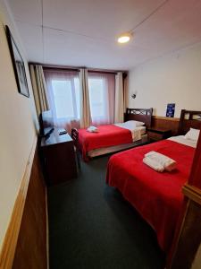 Postel nebo postele na pokoji v ubytování Hotel Condor de Plata