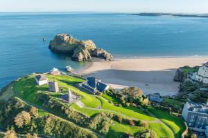 an aerial view of a house on a island in the ocean at Ffawydd-Y-Ffynnon in Llanfyrnach