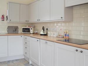 Kuchyň nebo kuchyňský kout v ubytování Lili Wen