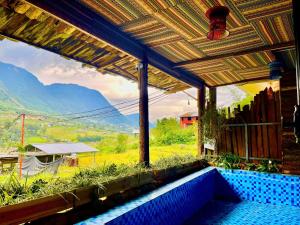 a building with a view of a mountain at Sky View hostel in Sapa