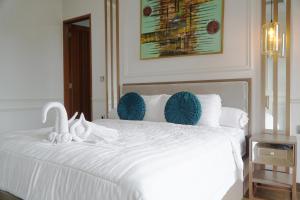 Кровать или кровати в номере Villa 4R Ungasan