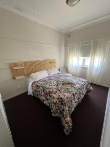 Ένα ή περισσότερα κρεβάτια σε δωμάτιο στο Clanwilliam