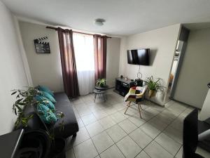 TV a/nebo společenská místnost v ubytování Depto. Arriendo Diario - La Serena