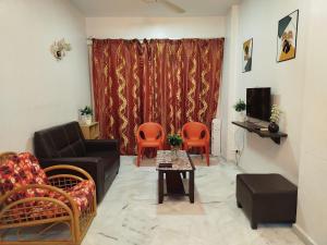 TV a/nebo společenská místnost v ubytování Glory Beach Resort Beach View